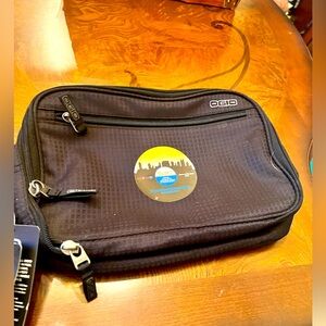 NWT OGIO travel accessory bag black with welcome to Nashville logo on the front